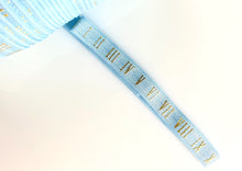 Load image into Gallery viewer, Gold Roman Numerals on Baby Blue - FOE - Fold Over Elastic - Fantastic Elastic Company